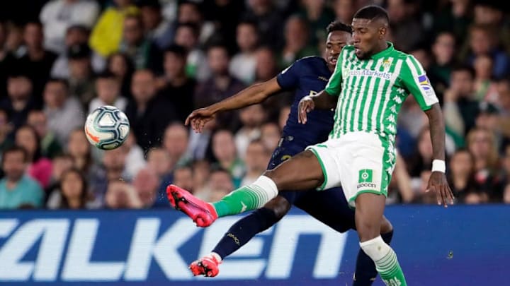 SEVILLA, SPAIN - MARCH 8: (L-R) Vinicius Jr. of Real Madrid, Emerson of Real Betis Sevilla during the La Liga Santander match between Real Betis Sevilla v Real Madrid at the Estadio Benito Villamarin on March 8, 2020 in Sevilla Spain (Photo by Eric Verhoeven/Soccrates/Getty Images)