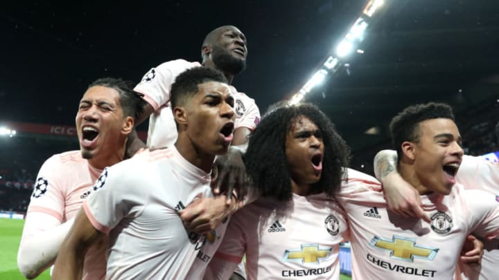 PARIS, FRANCE - MARCH 06: Marcus Rashford of Manchester United celebrates after scoring his sides third goal with teammates Chris Smalling and Tahith Chong during the UEFA Champions League Round of 16 Second Leg match between Paris Saint-Germain and Manchester United at Parc des Princes on March 06, 2019 in Paris, . (Photo by Julian Finney/Getty Images)