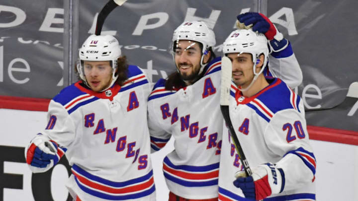 Mar 25, 2021; Philadelphia, Pennsylvania, USA; New York Rangers center Mika Zibanejad (93) celebrates his goal with left wing Artemi Panarin (10) and left wing Chris Kreider (20) against the Philadelphia Flyers during the first period at Wells Fargo Center. Mandatory Credit: Eric Hartline-USA TODAY Sports