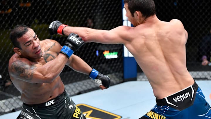 LAS VEGAS, NEVADA - JUNE 26: (R-L) Shavkat Rakhmonov of Uzbekistan punches Michel Prazeres of Brazil in a welterweight fight during the UFC Fight Night event at UFC APEX on June 26, 2021 in Las Vegas, Nevada. (Photo by Chris Unger/Zuffa LLC)