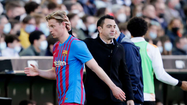 VALENCIA, SPAIN - FEBRUARY 20: Coach Xavi Hernandez of FC Barcelona Frenkie de Jong of FC Barcelona during the La Liga Santander match between Valencia v FC Barcelona at the Estadio de Mestalla on February 20, 2022 in Valencia Spain (Photo by David S. Bustamante/Soccrates/Getty Images)