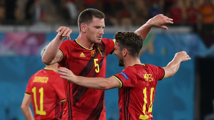 TOPSHOT – Belgium’s defender Jan Vertonghen (L) and Belgium’s forward Dries Mertens celebrate their victory at the end of the UEFA EURO 2020 round of 16 football match between Belgium and Portugal at La Cartuja Stadium in Seville on June 27, 2021. (Photo by LLUIS GENE / POOL / AFP) (Photo by LLUIS GENE/POOL/AFP via Getty Images)