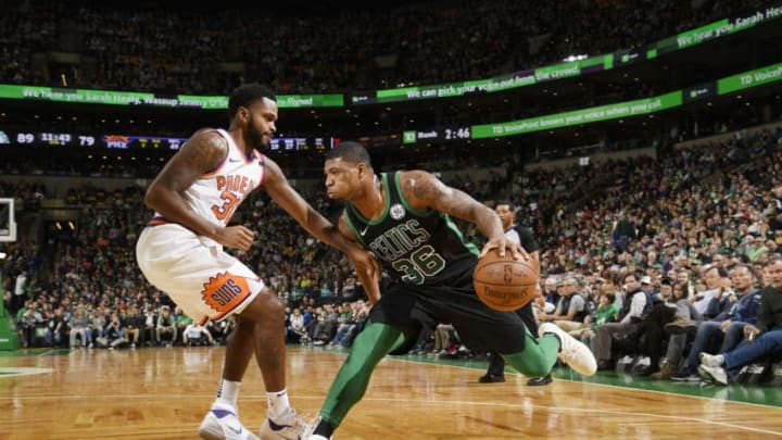 BOSTON, MA - DECEMBER 2: Marcus Smart #36 of the Boston Celtics handles the ball against Troy Daniels #30 of the Phoenix Suns on December 2, 2017 at the TD Garden in Boston, Massachusetts. NOTE TO USER: User expressly acknowledges and agrees that, by downloading and or using this photograph, User is consenting to the terms and conditions of the Getty Images License Agreement. Mandatory Copyright Notice: Copyright 2017 NBAE (Photo by Brian Babineau/NBAE via Getty Images)