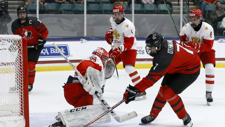 FRISCO, TEXAS – MAY 06: Brennan Othmann #7 of Canada puts a shot on goal against Sergei Ivanov #29 of Russia in the first period during the 2021 IIHF Ice Hockey U18 World Championship Gold Medal Game at Comerica Center on May 06, 2021 in Frisco, Texas. (Photo by Tom Pennington/Getty Images)
