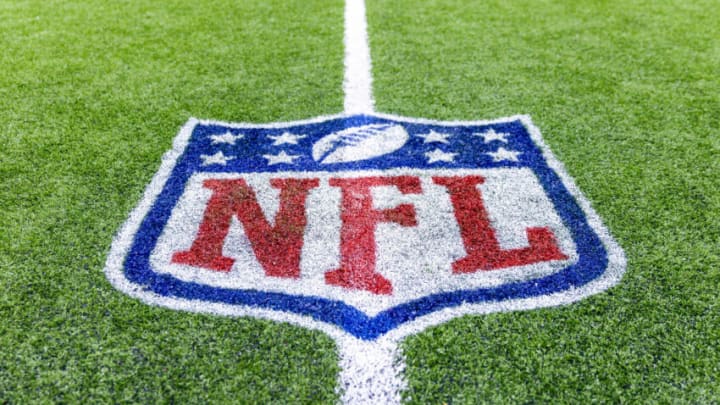 Jan 8, 2023; New Orleans, Louisiana, USA; Detailed view of the NFL shield logo on the field after the game between the New Orleans Saints and the Carolina Panthers at Caesars Superdome. Mandatory Credit: Stephen Lew-USA TODAY Sports