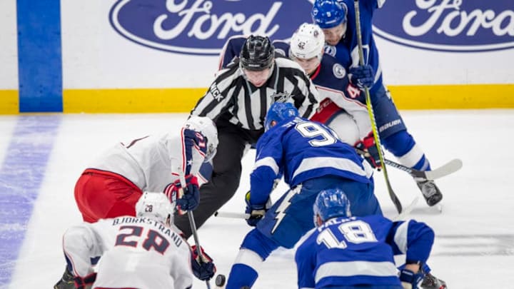 TAMPA, FL - APRIL 10: Tampa Bay Lightning center Steven Stamkos (91) and Columbus Blue Jackets left wing Nick Foligno (71) faceoff during the Stanley Cup Playoffs between the Lightning and Columbus on April 10, 2019 at Amalie Arena in Tampa, FL. (Photo by Andrew Bershaw/Icon Sportswire via Getty Images)