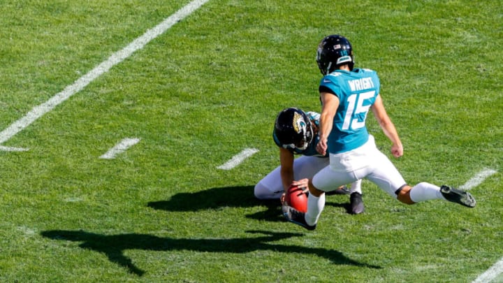 Jan 9, 2022; Jacksonville, Florida, USA; Jacksonville Jaguars kicker Matthew Wright (15) kicks an extra point in the first quarter against the Indianapolis Colts at TIAA Bank Field. Mandatory Credit: Nathan Ray Seebeck-USA TODAY Sports