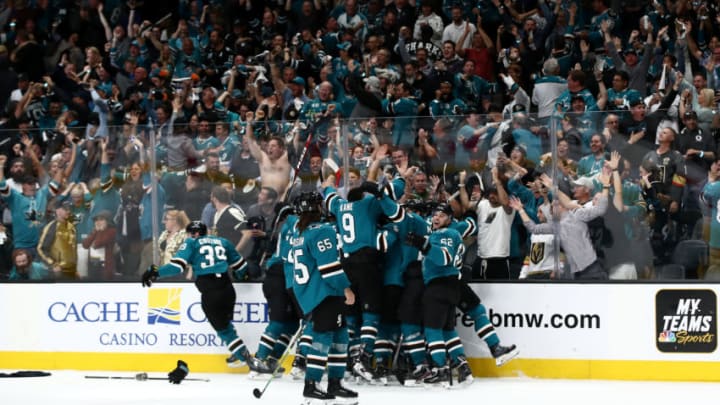 SAN JOSE, CALIFORNIA - APRIL 23: Barclay Goodrow #23 of the San Jose Sharks is congratulated by teammates after he scored the game winning goal in overtime against the Vegas Golden Knights in Game Seven of the Western Conference First Round during the 2019 NHL Stanley Cup Playoffs at SAP Center on April 23, 2019 in San Jose, California. (Photo by Ezra Shaw/Getty Images)