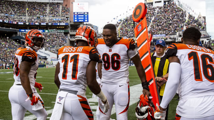SEATTLE, WA – SEPTEMBER 08: John Ross #11 of the Cincinnati Bengals is congratulated by Carlos Dunlap #96 after a 55 yard touchdown against the Seattle Seahawks at CenturyLink Field on September 8, 2019 in Seattle, Washington. (Photo by Lindsey Wasson/Getty Images)