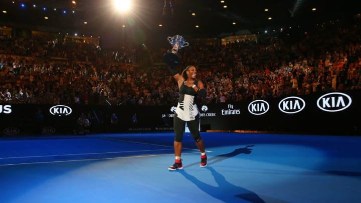 MELBOURNE, AUSTRALIA - JANUARY 28: Serena Williams waves to the crowd as she leaves the court with the Daphne Akhurst Trophy after winning the Women's Singles Final against Venus Williams of the United States on day 13 of the 2017 Australian Open at Melbourne Park on January 28, 2017 in Melbourne, Australia. (Photo by Scott Barbour/Getty Images)