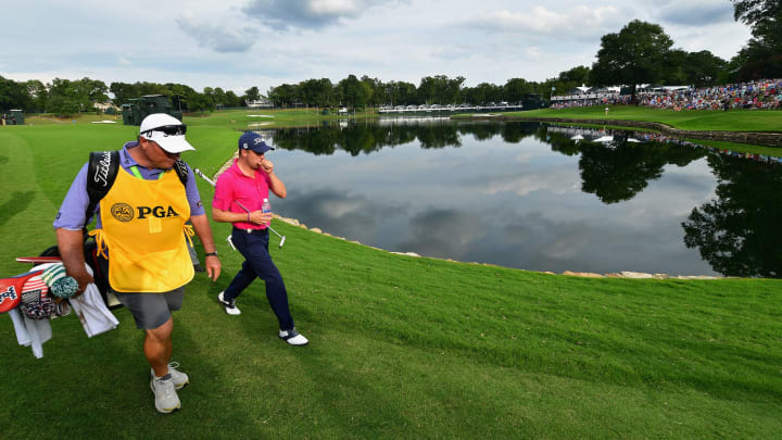 CHARLOTTE, NC – AUGUST 13: Justin Thomas of the United States walks to the on the 17th green during the final round of the 2017 PGA Championship at Quail Hollow Club on August 13, 2017 in Charlotte, North Carolina. (Photo by Stuart Franklin/Getty Images) DFS Golf