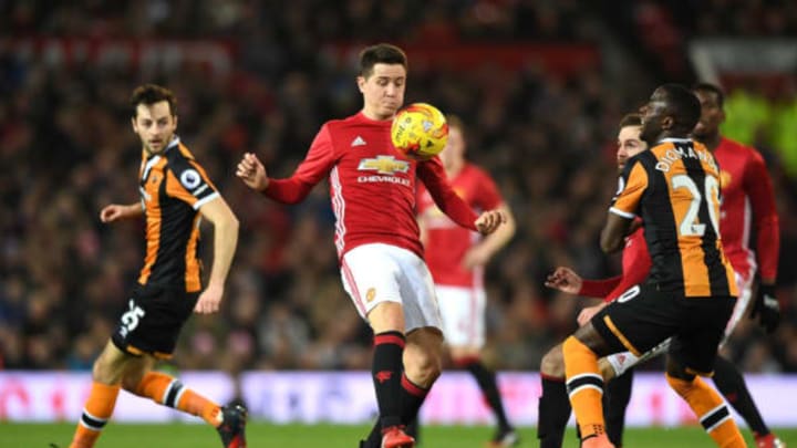 MANCHESTER, ENGLAND - JANUARY 10: Ander Herrera of Manchester United is closed down by Adama Diomande of Hull City during the EFL Cup Semi-Final First Leg match between Manchester United and Hull City at Old Trafford on January 10, 2017 in Manchester, England. (Photo by Shaun Botterill/Getty Images)