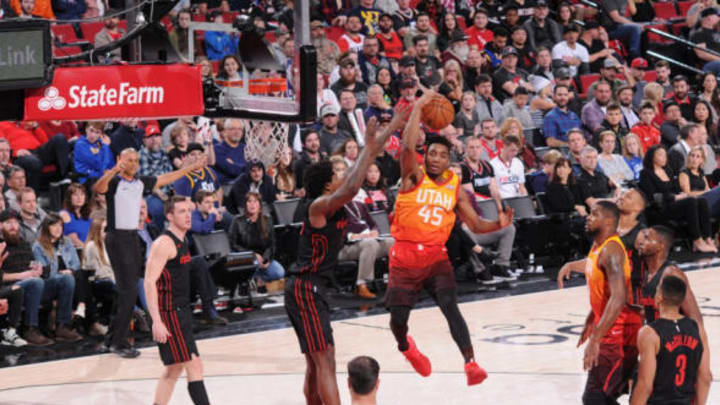 PORTLAND, OR – FEBRUARY 11: Donovan Mitchell #45 of the Utah Jazz shoots the ball against the Portland Trail Blazers on February 11, 2018 at the Moda Center in Portland, Oregon. NOTE TO USER: User expressly acknowledges and agrees that, by downloading and or using this Photograph, user is consenting to the terms and conditions of the Getty Images License Agreement. Mandatory Copyright Notice: Copyright 2018 NBAE (Photo by Sam Forencich/NBAE via Getty Images)