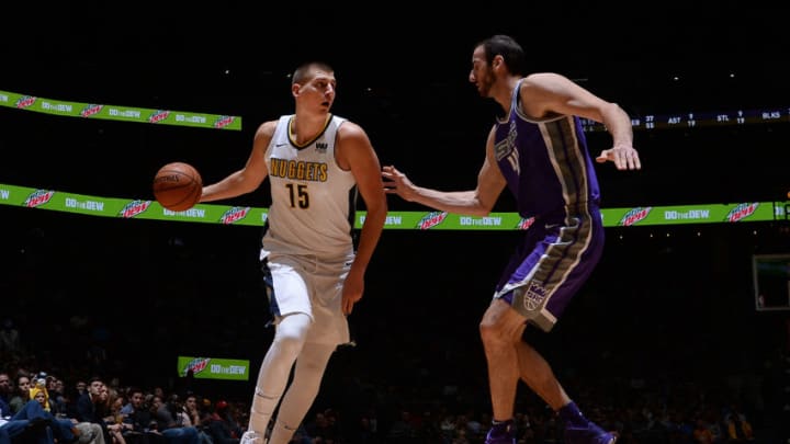 DENVER, CO - OCTOBER 21: Nikola Jokic #15 of the Denver Nuggets handles the ball against the Sacramento Kings on October 21, 2017 at the Pepsi Center in Denver, Colorado. NOTE TO USER: User expressly acknowledges and agrees that, by downloading and/or using this Photograph, user is consenting to the terms and conditions of the Getty Images License Agreement. Mandatory Copyright Notice: Copyright 2017 NBAE (Photo by Bart Young/NBAE via Getty Images)