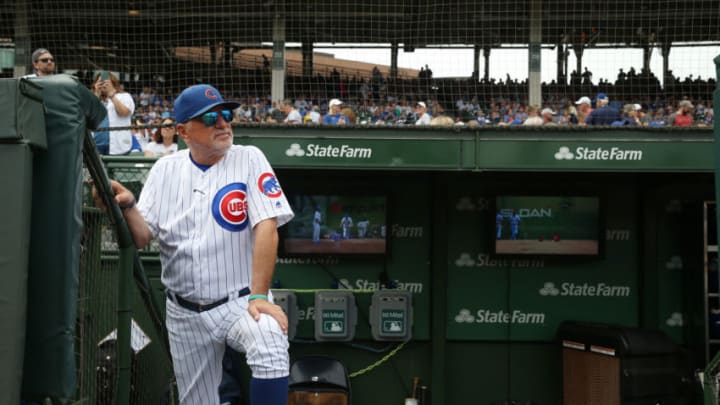 Chicago Cubs manager Joe Maddon watches a video tribute to WGN Broadcasting before a game against the St. Louis Cardinals at Wrigley Field in Chicago on Saturday, Sept. 21, 2019. (John J. Kim/Chicago Tribune/Tribune News Service via Getty Images)