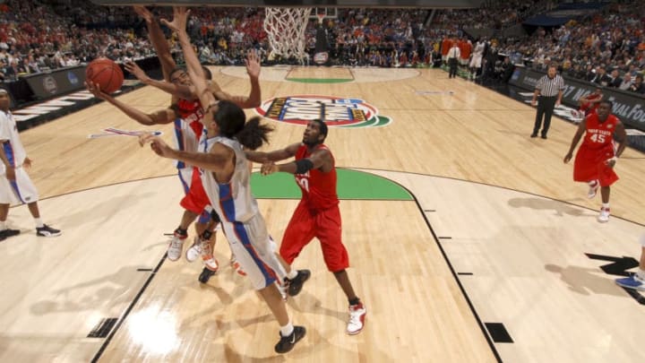 02 APR 2007: Mike Conley Jr. (1) of OSU battles for a shot against Joakim Noah (13) of Florida during the University of Florida vs Ohio State University championship game of the NCAA Men's Division I Basketball Final Four held at the Georgia Dome in Atlanta, GA. Florida defeated Ohio State 84-75 to win the national title. Chris Steppig/NCAA Photos via Getty Images