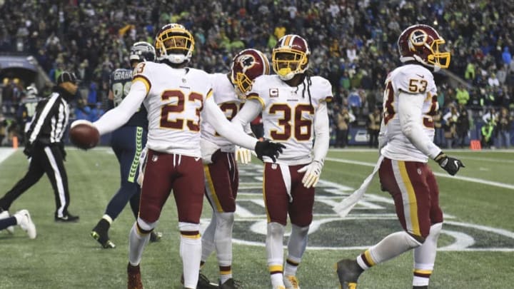 SEATTLE, WA - NOVEMBER 05: Free safety DeAngelo Hall #23 of the Washington Redskins throws the ball into the stands after breaking up a last-second pass in the game against the Seattle Seahawks at CenturyLink Field on November 5, 2017 in Seattle, Washington. The Redskins won 17-14. (Photo by Steve Dykes/Getty Images)