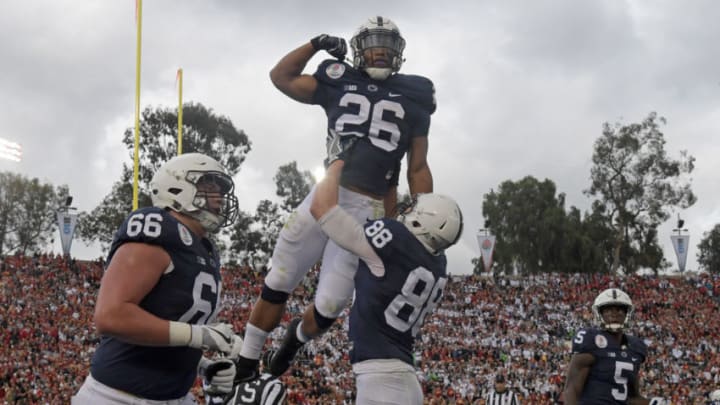 Jan 2, 2017; Pasadena, CA, USA; Penn State Nittany Lions running back Saquon Barkley (26) celebrates his touchdown with tight end Mike Gesicki (88) during the second quarter against the USC Trojans of the 2017 Rose Bowl game at Rose Bowl. Mandatory Credit: Kirby Lee-USA TODAY Sports