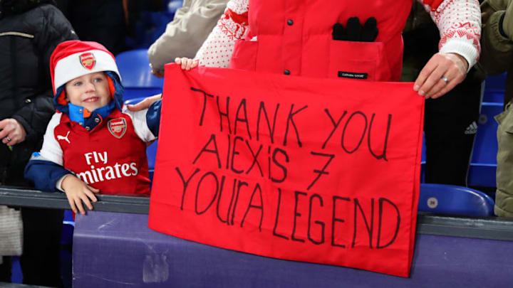 LONDON, ENGLAND - DECEMBER 28: A young Arsenal fan holds up a message thanking Alexis Sanchez of Arsenal during the Premier League match between Crystal Palace and Arsenal at Selhurst Park on December 28, 2017 in London, England. (Photo by Catherine Ivill/Getty Images)