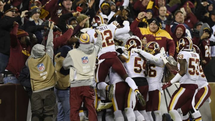 LANDOVER, MD - OCTOBER 21: The Washington Redskins celebrate after a fumble recovery for touchdown by linebacker Preston Smith #94 in the fourth quarter against the Dallas Cowboys at FedExField on October 21, 2018 in Landover, Maryland. (Photo by Patrick McDermott/Getty Images)