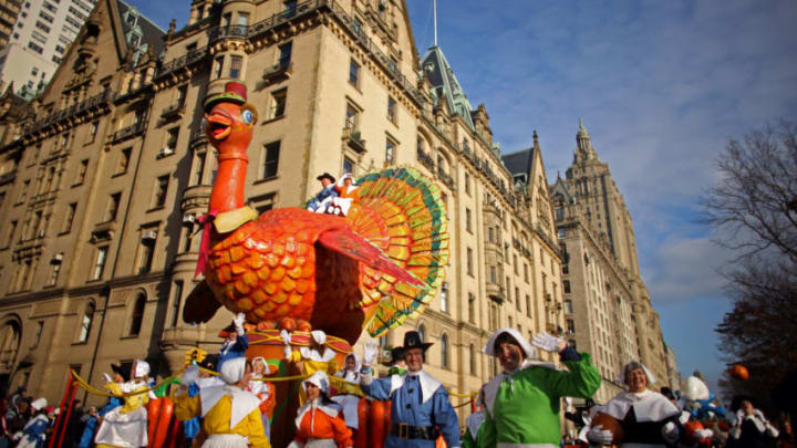 NEW YORK - NOVEMBER 27: Parade participants guide a turkey float at the annual Macy's Thanksgiving Day Parade on November 27, 2008 in New York City. (Photo by Yana Paskova/Getty Images)