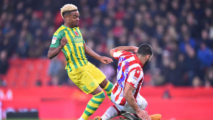 STOKE ON TRENT, ENGLAND - NOVEMBER 04: Grady Diangana of West Bromwich is awarded a penalty after Cameron Carter-Vickers of Stoke City miss times a tackle during the Sky Bet Championship match between Stoke City and West Bromwich Albion at Bet365 Stadium on November 04, 2019 in Stoke on Trent, England. (Photo by Nathan Stirk/Getty Images)
