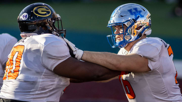 Jan 28, 2021; American offensive lineman David Moore of Grambling State (60) drills against American offensive lineman Drake Jackson of Kentucky (76) during American practice at Hancock Whitney Stadium in Mobile, Alabama, USA; Mandatory Credit: Vasha Hunt-USA TODAY Sports