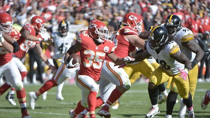 Oct 25, 2015; Kansas City, MO, USA; Kansas City Chiefs running back Charcandrick West (35) runs the ball as Pittsburgh Steelers linebacker Bud Dupree (48) attempts the tackle during the second half at Arrowhead Stadium. The Chiefs won 23-13. Mandatory Credit: Denny Medley-USA TODAY Sports
