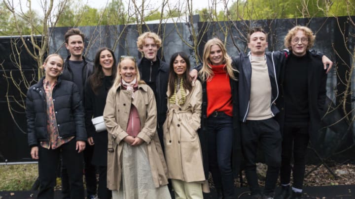 LYNGE, DENMARK - MAY 08: Actors in “The Rain” season 2 are posing together with guests at arrival after the bus ride to the “secret” destination for the Netflix's "The Rain" season 2 premiere evening on May 8, 2019 in Lynge, Denmark. At the photo appears the actors in the rearmost row: Alba August (”Simone”), Lynggaard Tønnesen (”Rasmus”), Mikkel Boe Følsgaard (“Martin”), Lukas Løkken (“Patrick”), Sonny Lindberg (“Jean”), Jessica Dinnage (“Lea”), Evin Ahmad (“Kira”)Clara Rosager (“Sarah”), Natalie Madueño (Fie”). (Photo by Ole Jensen/Getty Images for Netflix)