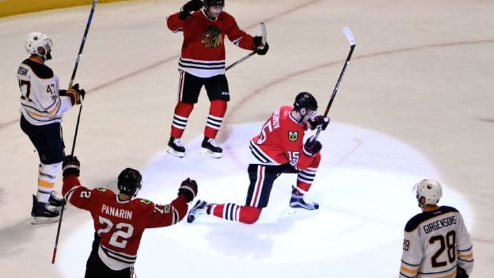Jan 5, 2017; Chicago, IL, USA; Chicago Blackhawks center Artem Anisimov (15) celebrates his goal against the Buffalo Sabres during the third period at the United Center. The Hawks won 4-3 in overtime. Mandatory Credit: David Banks-USA TODAY Sports