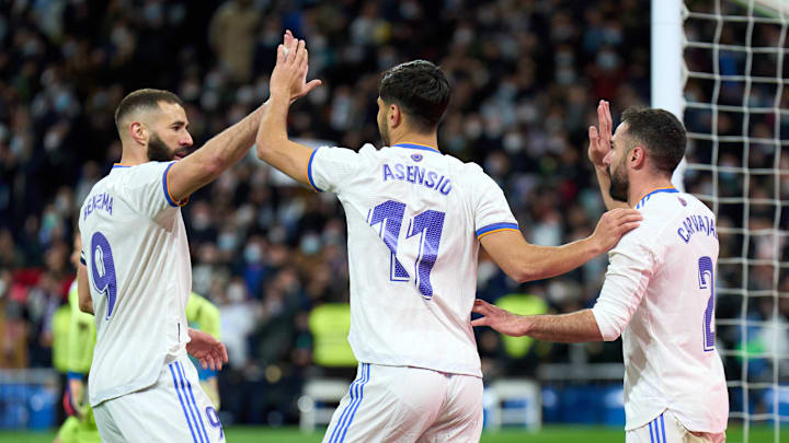 Marco Asensio, Karim Benzema and Daniel Carvajal, Real Madrid (Photo by Angel Martinez/Getty Images)