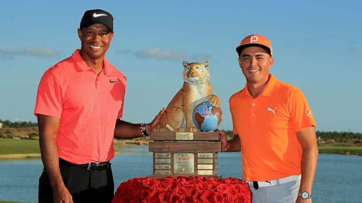 NASSAU, BAHAMAS - DECEMBER 03: Rickie Fowler of the United States poses with tournament host Tiger Woods after winning the Hero World Challenge at Albany, Bahamas on December 3, 2017 in Nassau, Bahamas. (Photo by Mike Ehrmann/Getty Images)