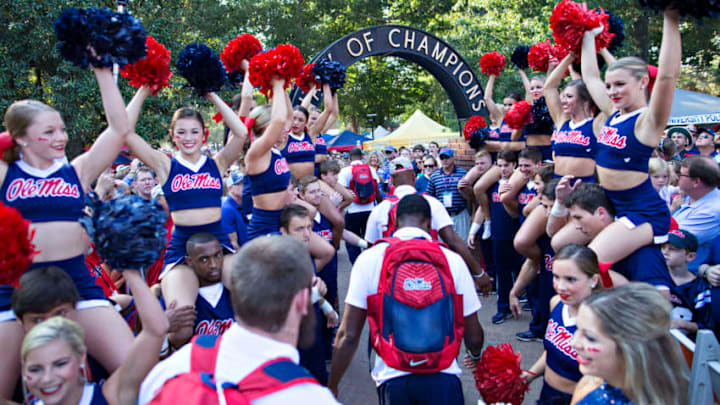OXFORD, MS - SEPTEMBER 24: Players of the Mississippi Rebels greets fans during the walk into the stadium before a game against the Georgia Bulldogs at Vaught-Hemingway Stadium on September 24, 2016 in Oxford, Mississippi. (Photo by Wesley Hitt/Getty Images)