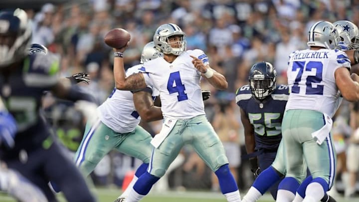 Aug 25, 2016; Seattle, WA, USA; Dallas Cowboys quarterback Dak Prescott (4) passes against the Seattle Seahawks during the first half of an NFL football game at CenturyLink Field. Mandatory Credit: Kirby Lee-USA TODAY Sports