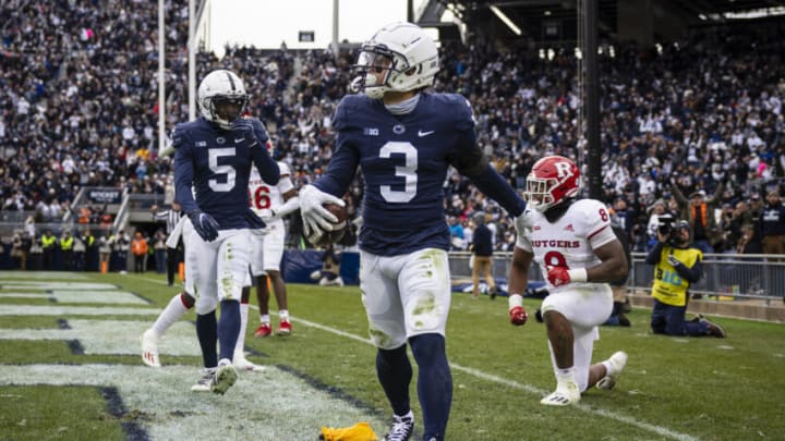 STATE COLLEGE, PA - NOVEMBER 20: Parker Washington #3 of the Penn State Nittany Lions reacts after catching a pass for a touchdown against Tyshon Fogg #8 of the Rutgers Scarlet Knights during the second half at Beaver Stadium on November 20, 2021 in State College, Pennsylvania. (Photo by Scott Taetsch/Getty Images)