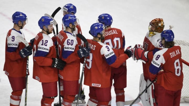 Czech David Sklenicka, Radek Faksa, Michal Moravcik, Radko Gudas, Libor Sulak, Pavel Francouz celebrate their victory at the end of the group A match France vs Czech Republic of the 2018 IIHF Ice Hockey World Championship at the Royal Arena in Copenhagen, Denmark, on May 13, 2018. - Czech Republic won 6-0. (Photo by Lars Moeller / Ritzau Scanpix / AFP) / Denmark OUT / The erroneous mention[s] appearing in the metadata of this photo by Lars Moeller has been modified in AFP systems in the following manner: [adding DENMARK OUT]. Please immediately remove the erroneous mention[s] from all your online services and delete it (them) from your servers. If you have been authorized by AFP to distribute it (them) to third parties, please ensure that the same actions are carried out by them. Failure to promptly comply with these instructions will entail liability on your part for any continued or post notification usage. Therefore we thank you very much for all your attention and prompt action. We are sorry for the inconvenience this notification may cause and remain at your disposal for any further information you may require. (Photo credit should read LARS MOELLER/AFP/Getty Images)
