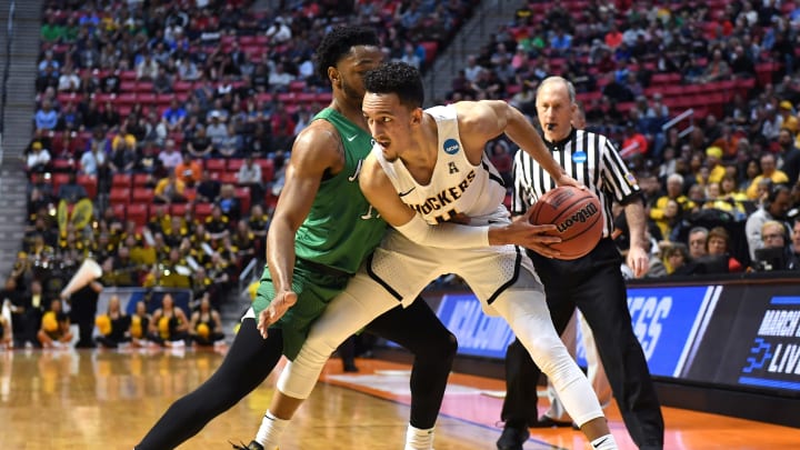 SAN DIEGO, CA – MARCH 16: Landry Shamet #11 of the Wichita State Shockers handles the ball against C.J. Burks #14 of the Marshall Thundering Herd in the first half during the first round of the 2018 NCAA Men’s Basketball Tournament at Viejas Arena on March 16, 2018 in San Diego, California. (Photo by Donald Miralle/Getty Images)
