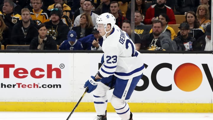 BOSTON, MA – APRIL 11: Toronto Maple Leafs defenseman Travis Dermott (23) skates the puck up ice during Game 1 of the First Round between the Boston Bruins and the Toronto Maple Leafs on April 11, 2019, at TD Garden in Boston, Massachusetts. (Photo by Fred Kfoury III/Icon Sportswire via Getty Images)