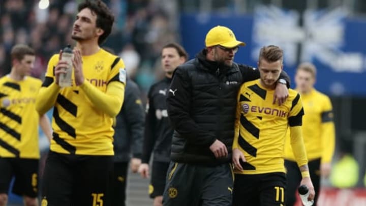 HAMBURG, GERMANY – MARCH 07: Head coach Juergen Klopp (L-R) and Marco Reus of Dortmund appears frustrated after the First Bundesliga match between Hamburger SV and Borussia Dortmund at Imtech Arena on March 7, 2015 in Hamburg, Germany. (Photo by Oliver Hardt/Bongarts/Getty Images)