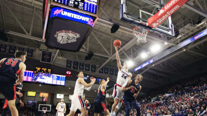 SPOKANE, WASHINGTON - JANUARY 04: Corey Kispert #24 of the Gonzaga Bulldogs puts up a shot against Kessler Edwards #15 of the Pepperdine Waves in the second half at McCarthey Athletic Center on January 04, 2020 in Spokane, Washington. Gonzaga defeats Pepperdine 75-70. (Photo by William Mancebo/Getty Images)