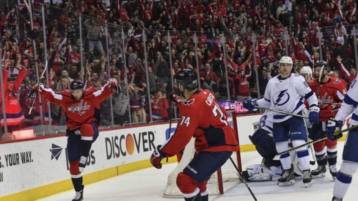 WASHINGTON, DC - MARCH 20: Washington Capitals center Evgeny Kuznetsov (92) left, celebrates his game-tying goal in the final minute of play during the third period in a game between the Tampa Bay Lightning and Washington Capitals at Capital One Arena on March 20, 2019 in Washington, D.C. Tampa Bay beat Washington 5-4. (Photo by Ricky Carioti/The Washington Post via Getty Images)
