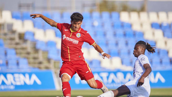 Carles Alena of Getafe and Eduardo Camavinga of Stade Rennais (Photo by Silvestre Szpylma/Quality Sport Images/Getty Images)