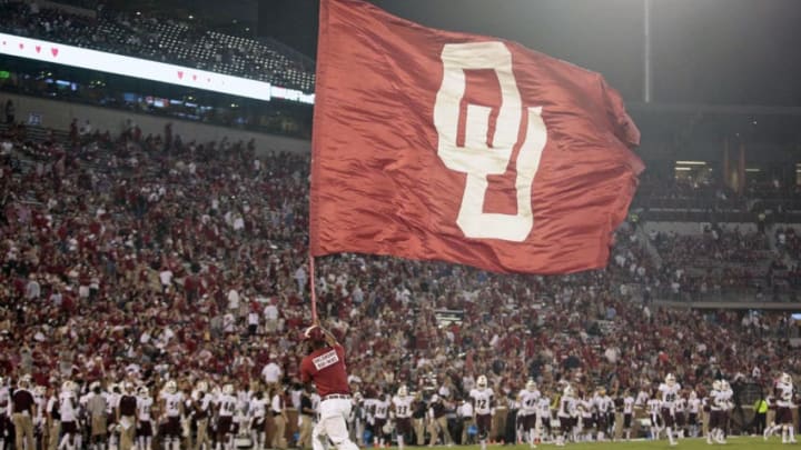 NORMAN, OK - SEPTEMBER 10 : An Oklahoma Sooners RUF/NEK waves a flag after a touchdown against the Louisiana Monroe Warhawks September 10, 2016 at Gaylord Family Memorial Stadium in Norman, Oklahoma. The Sooners defeated the Warhawks 59-17. (Photo by Brett Deering/Getty Images) *** local caption ***