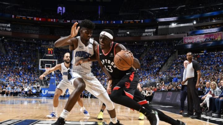 ORLANDO, FL - APRIL 19: Pascal Siakam #43 of the Toronto Raptors handles the ball against the Orlando Magic during Game Three of Round One of the 2019 NBA Playoffs on April 19, 2019 at Amway Center in Orlando, Florida. NOTE TO USER: User expressly acknowledges and agrees that, by downloading and or using this photograph, User is consenting to the terms and conditions of the Getty Images License Agreement. Mandatory Copyright Notice: Copyright 2019 NBAE (Photo by Fernando Medina/NBAE via Getty Images)