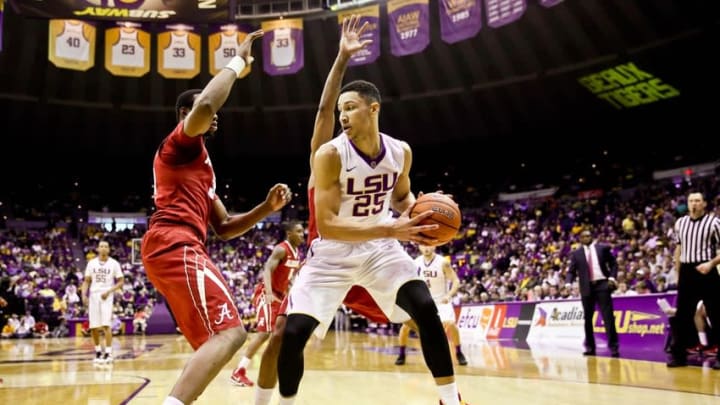 Feb 17, 2016; Baton Rouge, LA, USA; LSU Tigers forward Ben Simmons (25) is defended by Alabama Crimson Tide forward Donta Hall (35) during the first half of a game at the Pete Maravich Assembly Center. Mandatory Credit: Derick E. Hingle-USA TODAY Sports