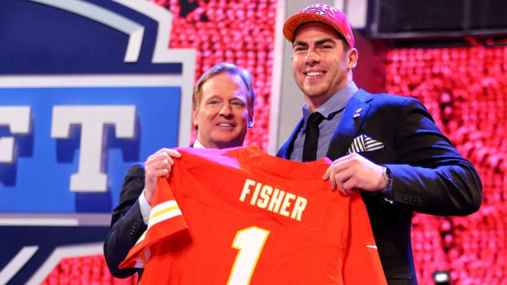NEW YORK, NY - APRIL 25: Eric Fisher (R) of Central Michigan Chippewas stands on stage with NFL COmmissioner Roger Goodell after Fisher was picked