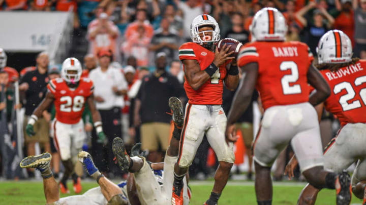 MIAMI, FL - NOVEMBER 03: Jaquan Johnson #4 of the Miami Hurricanes makes and interception in the second half against the Duke Blue Devils at Hard Rock Stadium on November 3, 2018 in Miami, Florida. (Photo by Mark Brown/Getty Images)