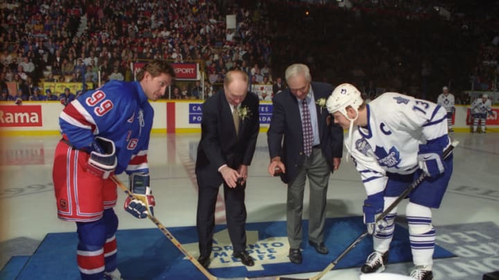 Red Kelly (middle left) and Andy Bathgate drop the puck between Wayne Gretzky #99 of the New York Rangers and Mats Sundin #13 of the Toronto Maple Leafs (Photo by Graig Abel/Getty Images)