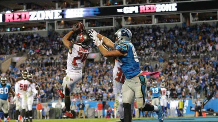 CHARLOTTE, NC - OCTOBER 10: Brent Grimes #24 of the Tampa Bay Buccaneers intercepts a pass intended for Greg Olsen #88 of the Carolina Panthers late in the fourth quarter during their game at Bank of America Stadium on October 10, 2016 in Charlotte, North Carolina. (Photo by Streeter Lecka/Getty Images)