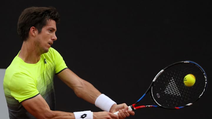 RIO DE JANEIRO, BRAZIL - FEBRUARY 22: Aljaz Bedene of Slovenia returns a shot to Pablo Carreno Busta of Spain during the ATP Rio Open 2018 at Jockey Club Brasileiro on February 22, 2018 in Rio de Janeiro, Brazil. (Photo by Buda Mendes/Getty Images)